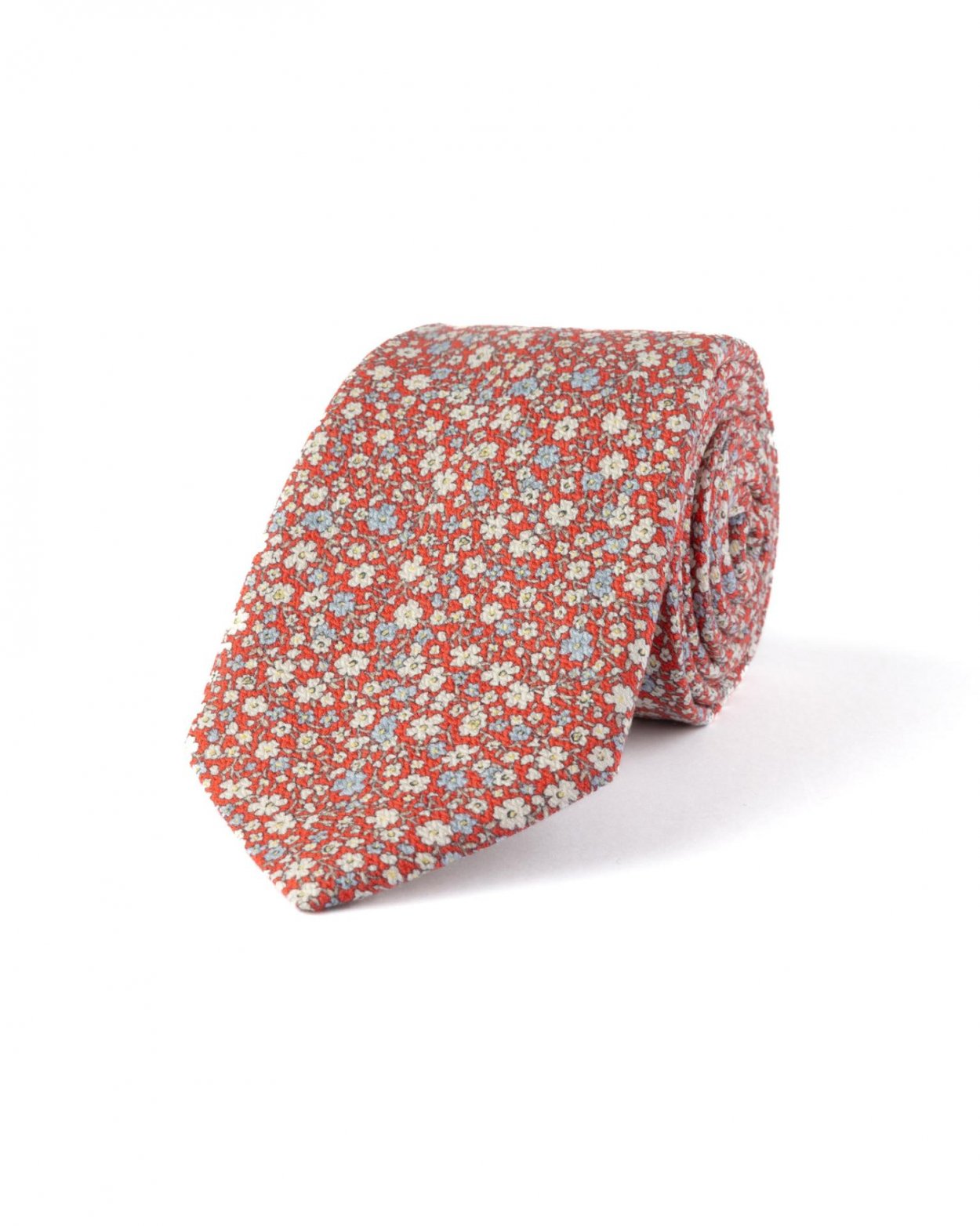 Červená hedvábná kravata s květinovým vzorem